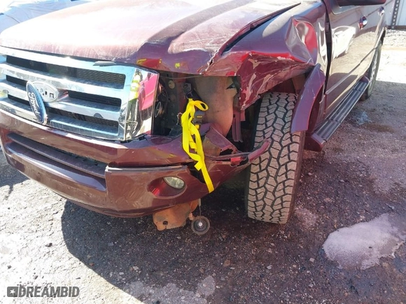 2012 Ford Expedition Limited with VIN 1FMJU1K54CEF57889, listed as a IAAI auction lot 41614817 with 186,376 mi miles. Bid and sale history available at carsss.com. Image 6.