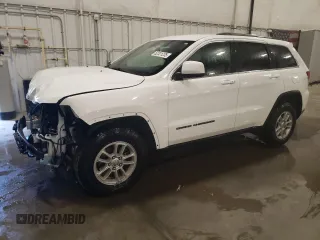 2020 Jeep Grand Cherokee Laredo E with VIN 1C4RJFAG2LC268005, listed as a Copart auction lot 52321235 with 63,285 mi miles and Salvage Title. Bid and sale history available at carsss.com. Image 1.