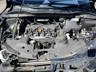 2021 Honda HR-V EX-L with VIN 3CZRU5H74MM719808, listed as a Copart auction lot 50609565 with 52,031 mi miles and Salvage Title. Bid and sale history available at carsss.com. Image 14.