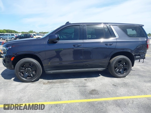 2022 Chevrolet Tahoe Commercial z VIN 1GNSCLED5NR336184, wystawiony jako IAAI lot #41729180 z przebiegiem 14 951 mil mil oraz . Historia ofert i sprzedaży dostępna na DreamBid. Obrazek 14.
