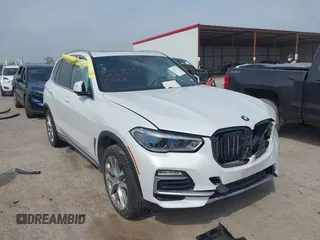 2019 BMW X5 xDrive40i z VIN 5UXCR6C52KLL05920, wystawiony jako IAAI lot #41934753 z przebiegiem 69 658 mil mil oraz . Historia ofert i sprzedaży dostępna na DreamBid. Obrazek 1.