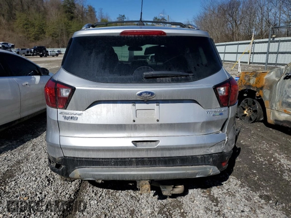 2019 Ford Escape Titanium with VIN 1FMCU9J98KUB53669, listed as a Copart auction lot 47344715 with 84,051 mi miles and Salvage title. Bid and sale history available at DreamBid. Image 6.