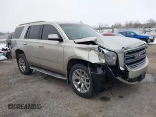2015 GMC Yukon SLT z VIN 1GKS2BKC6FR655777, wystawiony jako IAAI lot #40982330 z przebiegiem 120 627 mil mil oraz . Historia ofert i sprzedaży dostępna na DreamBid. Obrazek 1.