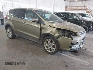 2013 Ford Escape SEL with VIN 1FMCU0HX0DUB83459, listed as a IAAI auction lot 41985453 with 198,182 mi miles and . Bid and sale history available at DreamBid. Image 1.