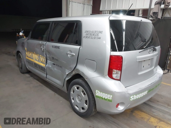 2012 Scion xB with VIN JTLZE4FE5CJ028608, listed as a IAAI auction lot 41916318 with 233,007 mi miles. Bid and sale history available at carsss.com. Image 3.