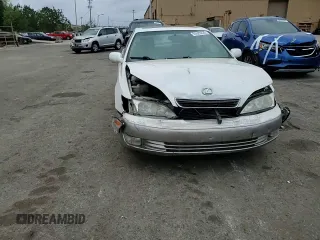1998 Lexus ES 300 с VIN JT8BF28G9W0141533, выставлен на аукционе Copart как лот 51620225 с пробегом 141 068 миль миль и Списание • Salvage title. История ставок и продаж доступна на DreamBid. Изображение 11.