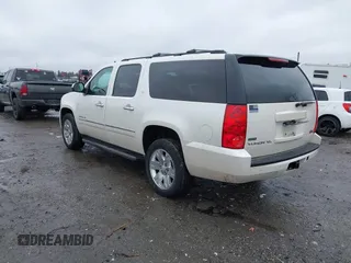 2012 GMC Yukon XL SLT with VIN 1GKS2KE77CR205341, listed as a IAAI auction lot 41565367 with 165,500 mi miles. Bid and sale history available at carsss.com. Image 3.