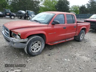 2002 Dodge Dakota SLT z VIN 1B7HL48N62S505775, wystawiony jako Copart lot #56285235 z przebiegiem 132 841 mil mil oraz Czysty tytuł • Clean title. Historia ofert i sprzedaży dostępna na DreamBid. Obrazek 1.