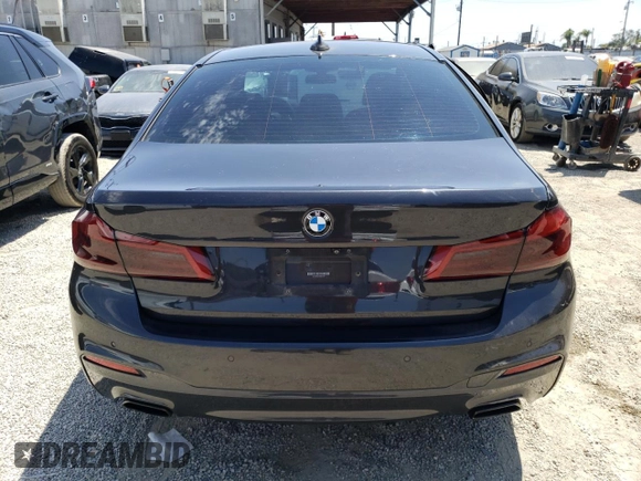 2018 BMW 5 Series 530e with VIN WBAJA9C55JG623181, listed as a Copart auction lot 61593983 with 63,577 mi miles and . Bid and sale history available at DreamBid. Image 6.