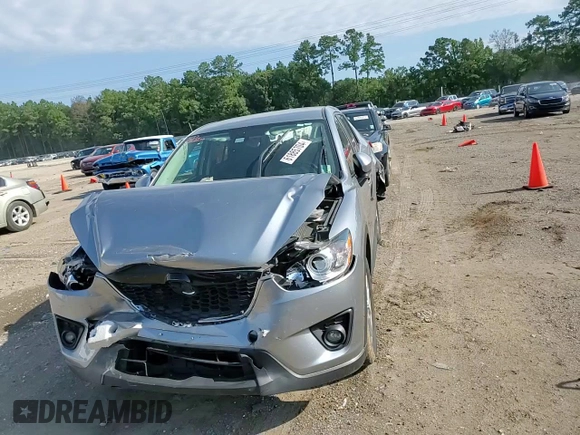 2015 Mazda CX-5 Touring with VIN JM3KE2CY7F0435914, listed as a Copart auction lot 61885704 with 0 mi miles and Salvage Title. Bid and sale history available at carsss.com. Image 11.