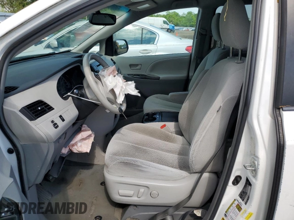 2014 Toyota Sienna LE AAS with VIN 5TDKK3DC6ES497746, listed as a Copart auction lot 56125845 with 142,596 mi miles and Salvage Title. Bid and sale history available at DreamBid. Image 7.