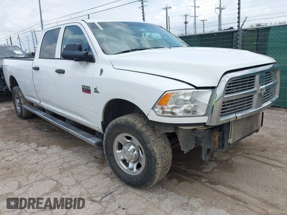 2012 Ram 2500 ST z VIN 3C6UD5HL6CG335854, wystawiony jako IAAI lot #42102244 z przebiegiem 187 838 mil mil oraz . Historia ofert i sprzedaży dostępna na DreamBid. Obrazek 1.