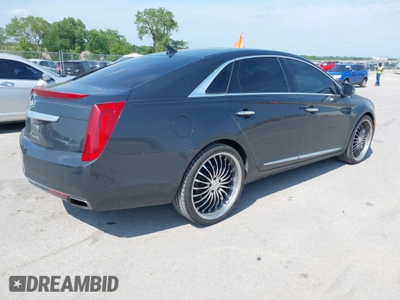 2013 Cadillac XTS Luxury с VIN 2G61P5S38D9170691, выставлен на аукционе IAAI как лот 42440984 с пробегом 213 492 миль миль и . История ставок и продаж доступна на DreamBid. Изображение 4.