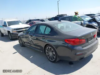 2019 BMW 5 Series 530i xDrive with VIN WBAJA7C50KG910479, listed as a IAAI auction lot 41802413 with 84,932 mi miles. Bid and sale history available at carsss.com. Image 3.