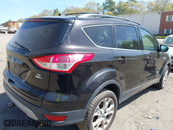 2013 Ford Escape SE with VIN 1FMCU9GX3DUA51379, listed as a IAAI auction lot 42175420 with 166,522 mi miles. Bid and sale history available at carsss.com. Image 4.