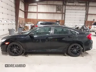 2019 Honda Civic Sport with VIN 2HGFC2F89KH557466, listed as a IAAI auction lot 42335216 with 138,747 mi miles and . Bid and sale history available at DreamBid. Image 14.