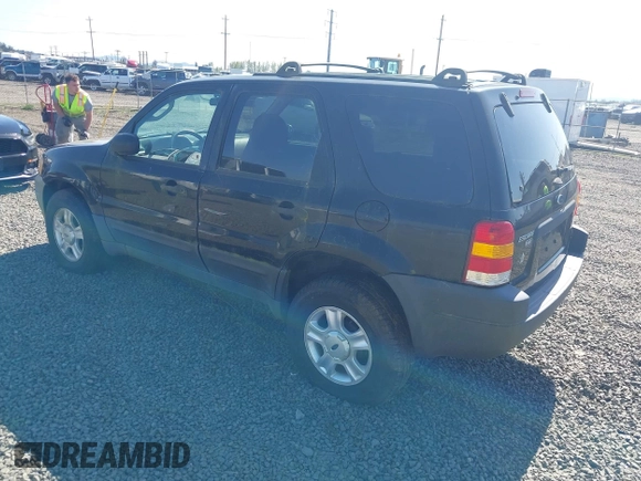 2003 Ford Escape XLT Popular 2 with VIN 1FMYU93113KC18744, listed as a IAAI auction lot 42027721 with 234,338 mi miles and . Bid and sale history available at DreamBid. Image 3.