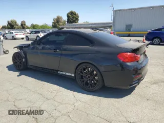 2015 BMW M4 with VIN WBS3R9C50FK333819, listed as a Copart auction lot 61105565 with 168,932 mi miles and Salvage title. Bid and sale history available at DreamBid. Image 2.