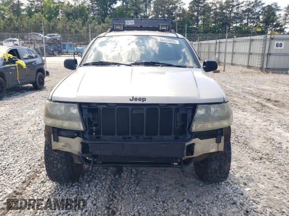 2004 Jeep Grand Cherokee Laredo z VIN 1J4GW48S84C177274, wystawiony jako Copart lot #56468855 z przebiegiem 236 014 mil mil oraz Szkoda całkowita • Salvage title. Historia ofert i sprzedaży dostępna na DreamBid. Obrazek 5.