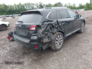 2018 Subaru Outback Touring with VIN 4S4BSETCXJ3232171, listed as a IAAI auction lot 42470956 with 124,650 mi miles and . Bid and sale history available at DreamBid. Image 4.