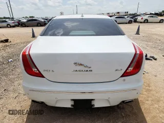 2015 Jaguar XJ Portfolio with VIN SAJWA2GZ7F8V82990, listed as a Copart auction lot 63325535 with 113,892 mi miles and Salvage title. Bid and sale history available at DreamBid. Image 6.