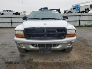 2002 Dodge Dakota SLT z VIN 1B7HL48N22S636413, wystawiony jako Copart lot #47884475 z przebiegiem 226 723 mil mil oraz Czysty tytuł • Clean title. Historia ofert i sprzedaży dostępna na DreamBid. Obrazek 5.