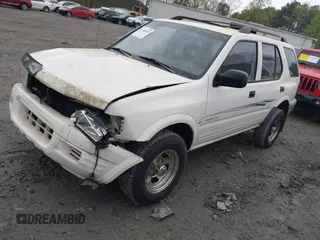 1998 Isuzu Rodeo S с VIN 4S2CM58W4W4303926, выставлен на аукционе IAAI как лот 41908569 с пробегом 212 353 миль миль и . История ставок и продаж доступна на DreamBid. Изображение 2.