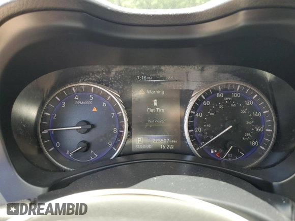 2014 Infiniti Q50 Premium z VIN JN1BV7AP4EM678784, wystawiony jako Copart lot #56641775 z przebiegiem 225 507 mil mil oraz Czysty tytuł • Clean title. Historia ofert i sprzedaży dostępna na DreamBid. Obrazek 9.