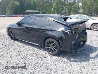 2023 Honda Civic Sport Touring z VIN 19XFL1H88PE001075, wystawiony jako IAAI lot #42212799 z przebiegiem 28 761 mil mil oraz . Historia ofert i sprzedaży dostępna na DreamBid. Obrazek 3.
