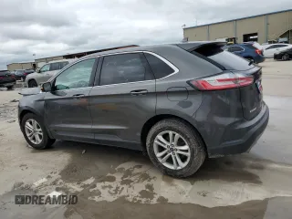 2019 Ford Edge SEL z VIN 2FMPK4J92KBB21770, wystawiony jako Copart lot #56056585 z przebiegiem 64 042 mil mil oraz Szkoda całkowita • Salvage title. Historia ofert i sprzedaży dostępna na DreamBid. Obrazek 2.