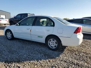 2002 Honda Civic z VIN 1HGEN26532L000390, wystawiony jako Copart lot #80095344 z przebiegiem 162 638 mil mil oraz Czysty tytuł • Clean title. Historia ofert i sprzedaży dostępna na DreamBid. Obrazek 2.