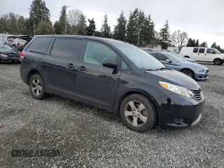 2012 Toyota Sienna with VIN 5TDKA3DC0CS014719, listed as a Copart auction lot 88358865 with 118,901 mi miles and Salvage Title. Bid and sale history available at DreamBid. Image 4.