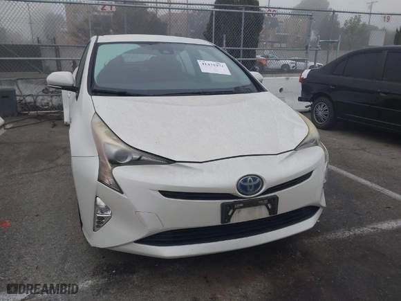 2017 Toyota Prius Two with VIN JTDKARFUXH3037751, listed as a IAAI auction lot 41471974 with 140,787 mi miles. Bid and sale history available at carsss.com. Image 13.
