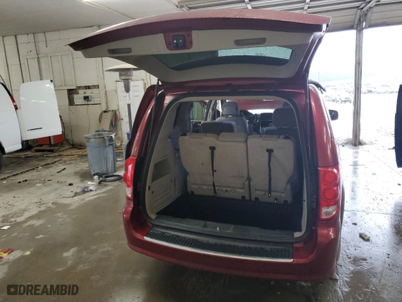 2014 Dodge Grand Caravan SXT with VIN 2C4RDGBGXER109819, listed as a Copart auction lot 44815955 with 125,571 mi miles and Salvage Title. Bid and sale history available at carsss.com. Image 6.