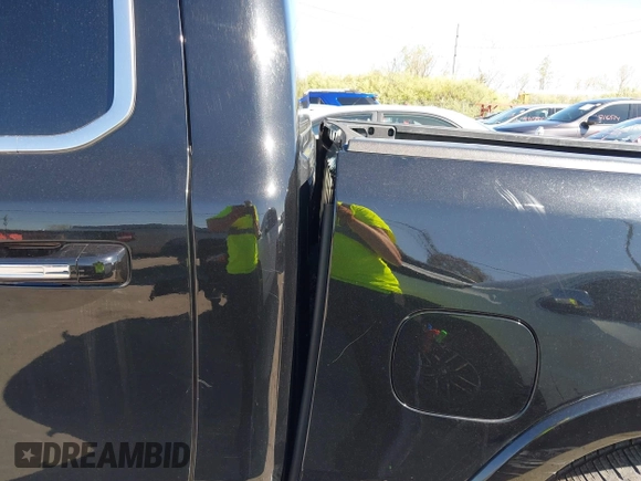 2020 Ram 1500 Limited with VIN 1C6SRFHT1LN219449, listed as a IAAI auction lot 42124421 with 117,976 mi miles and . Bid and sale history available at DreamBid. Image 6.