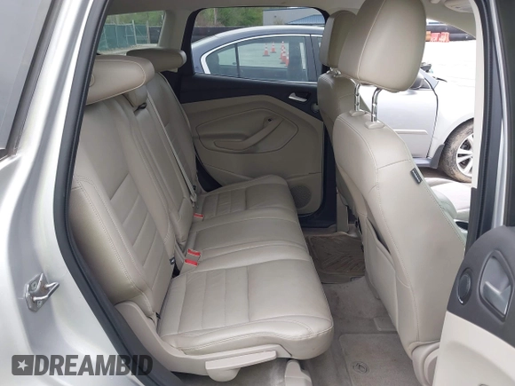 2013 Ford Escape SEL with VIN 1FMCU0HX1DUB81641, listed as a IAAI auction lot 42090788 with 111,496 mi miles and . Bid and sale history available at DreamBid. Image 8.