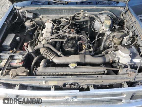 1994 Toyota Pickup z VIN 4TARN93P9RZ255143, wystawiony jako Copart lot #49554475 z przebiegiem 249 957 mil mil oraz Szkoda całkowita • Salvage title. Historia ofert i sprzedaży dostępna na DreamBid. Obrazek 11.
