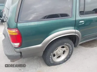2000 Ford Explorer XLT z VIN 1FMZU63EXYZA22693, wystawiony jako IAAI lot #41350520 z przebiegiem 244 843 mil mil oraz . Historia ofert i sprzedaży dostępna na DreamBid. Obrazek 6.