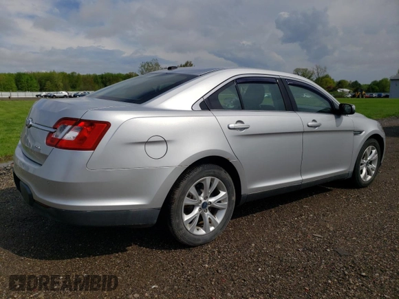 2011 Ford Taurus SEL z VIN 1FAHP2EW3BG119538, wystawiony jako Copart lot #54734985 z przebiegiem 53 753 mil mil oraz Szkoda całkowita • Salvage title. Historia ofert i sprzedaży dostępna na DreamBid. Obrazek 3.