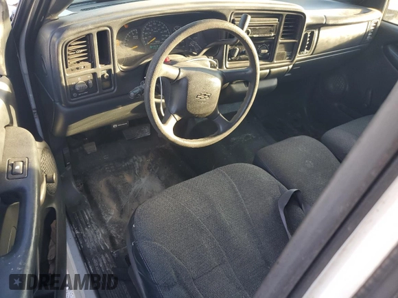 2000 Chevrolet Silverado 1500 with VIN 2GCEC19WXY1113447, listed as a Copart auction lot 77107304 with 242,406 mi miles and Salvage Title. Bid and sale history available at DreamBid. Image 8.
