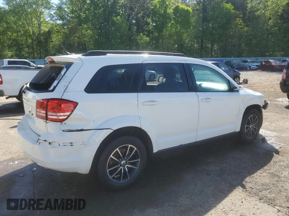 2018 Dodge Journey SE with VIN 3C4PDCAB6JT386173, listed as a Copart auction lot 52683195 with 133,440 mi miles and Salvage Title. Bid and sale history available at carsss.com. Image 3.