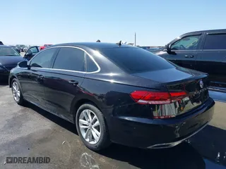2020 Volkswagen Passat 2.0T SE with VIN 1VWWA7A34LC024309, listed as a IAAI auction lot 41839846 with 133,999 mi miles. Bid and sale history available at carsss.com. Image 3.