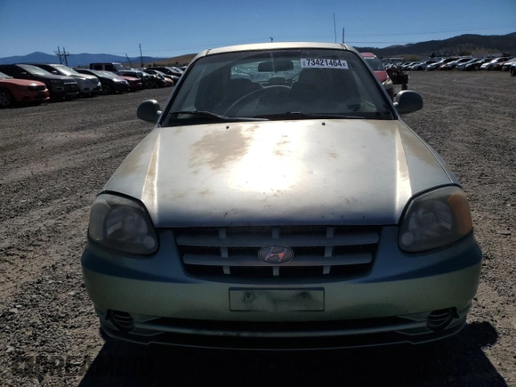 2003 Hyundai Accent GL with VIN KMHCG35C83U257641, listed as a Copart auction lot 73421464 with 143,814 mi miles and Clean Title. Bid and sale history available at carsss.com. Image 5.