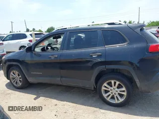 2015 Jeep Cherokee Sport z VIN 1C4PJLAB6FW608026, wystawiony jako IAAI lot #42282284 z przebiegiem Nie podano mil oraz . Historia ofert i sprzedaży dostępna na DreamBid. Obrazek 13.
