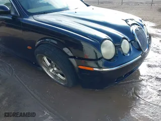 2003 Jaguar S-Type with VIN SAJEA01T43FM88318, listed as a IAAI auction lot 41290433 with 1 mi miles. Bid and sale history available at carsss.com. Image 6.