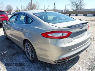 2015 Ford Fusion Titanium with VIN 3FA6P0D91FR236699, listed as a IAAI auction lot 41977478 with 203,394 mi miles. Bid and sale history available at carsss.com. Image 3.