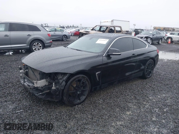 2015 BMW 4 Series 428i xDrive with VIN WBA3N5C56FK197981, listed as a IAAI auction lot 41145927 with 101,944 mi miles and . Bid and sale history available at DreamBid. Image 18.