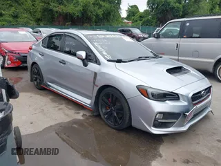 2016 Subaru WRX Premium with VIN JF1VA1E65G9810869, listed as a IAAI auction lot 40041936 with 143,830 mi miles and . Bid and sale history available at DreamBid. Image 1.