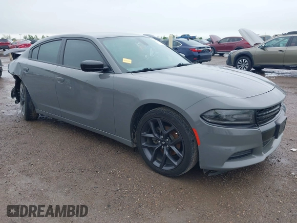 2019 Dodge Charger SXT with VIN 2C3CDXBG7KH554272, listed as a IAAI auction lot 41964492 with 126,174 mi miles. Bid and sale history available at carsss.com. Image 1.