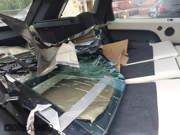 2022 Land Rover Range Rover Sport HST with VIN SALWS2RUXNA205731, listed as a IAAI auction lot 42613333 with 32,845 mi miles and . Bid and sale history available at DreamBid. Image 8.